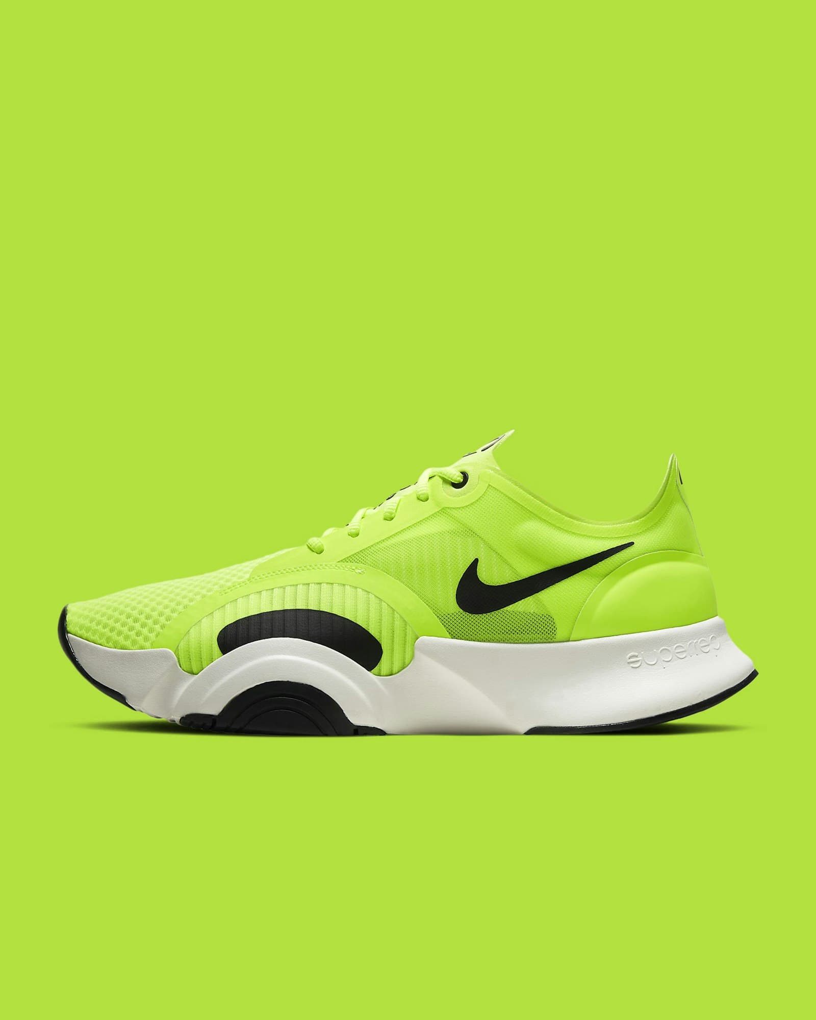 Une chaussure de course verte et noire